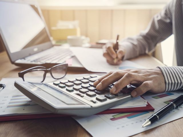 Businessman working on Desk office business financial accounting calculate